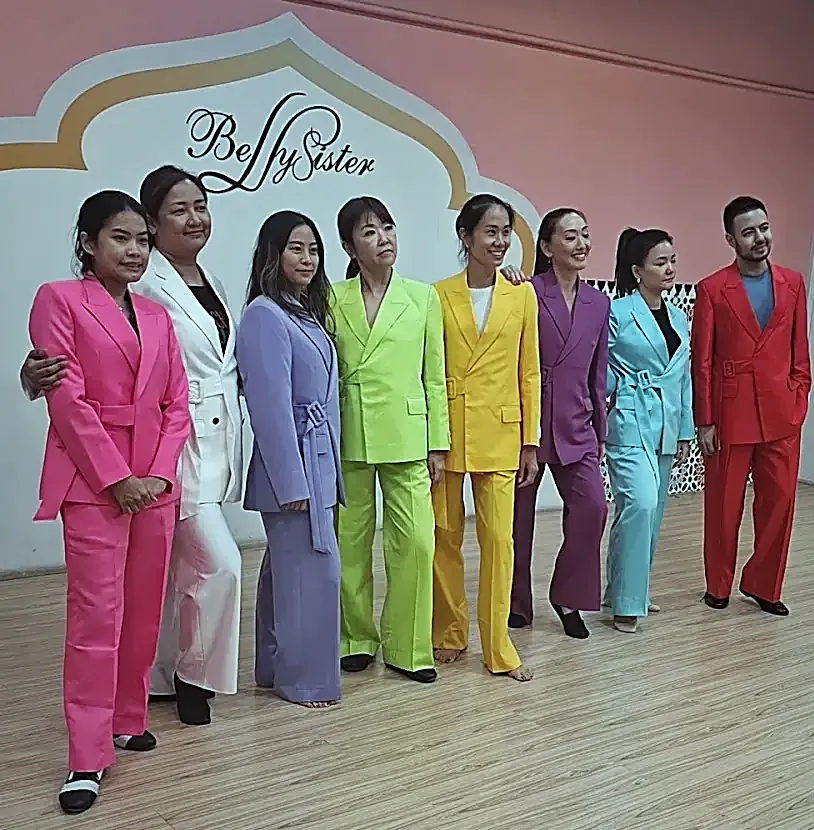 Performance suits in eight colours, cut to one pattern for a group.